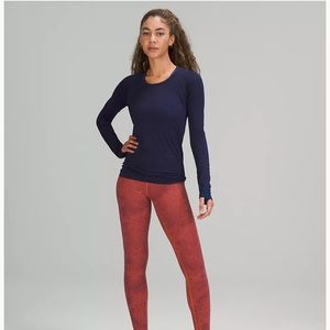 Brand new with tag Swiftly Tech Long sleeve in true navy/larkspur size 4